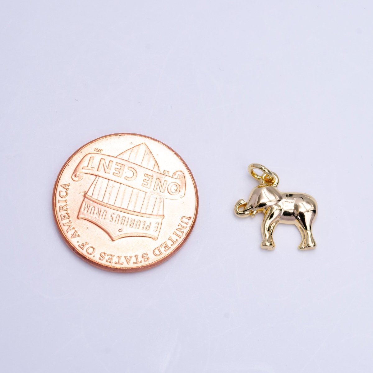 Mini Gold Elephant Charm AC-1398