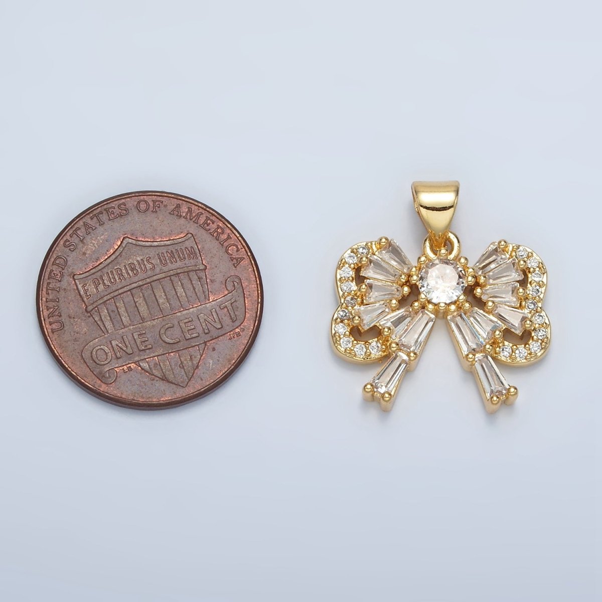 24K Gold Filled Bow Ribbon Baguette Micro Paved CZ Pendant | I274