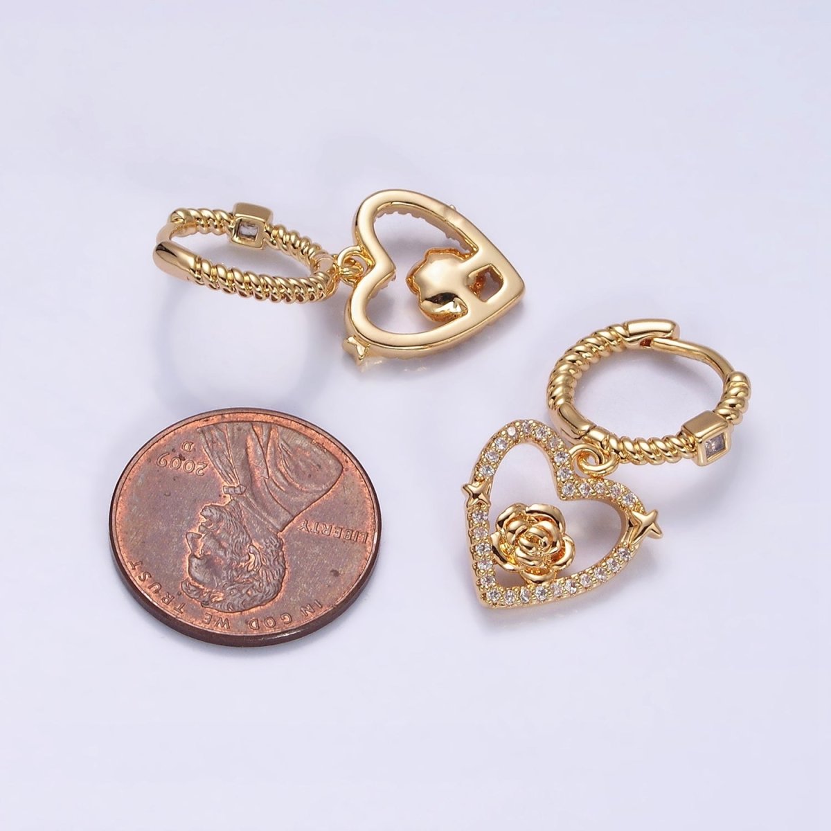 16K Gold Filled Rose Star Open Micro Paved Drop Twisted Heart CZ Huggie Earrings in Gold & Silver | AD1128 AD1129