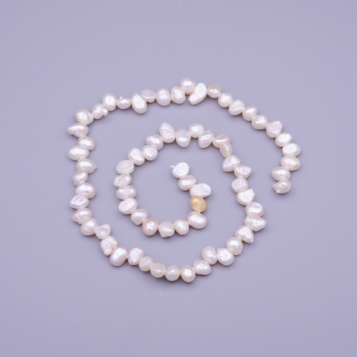 6.7mm - 7.6mm Nugget Seed White Natural Freshwater Pearl 71pcs Full Strand | WA-1317 Clearance Pricing