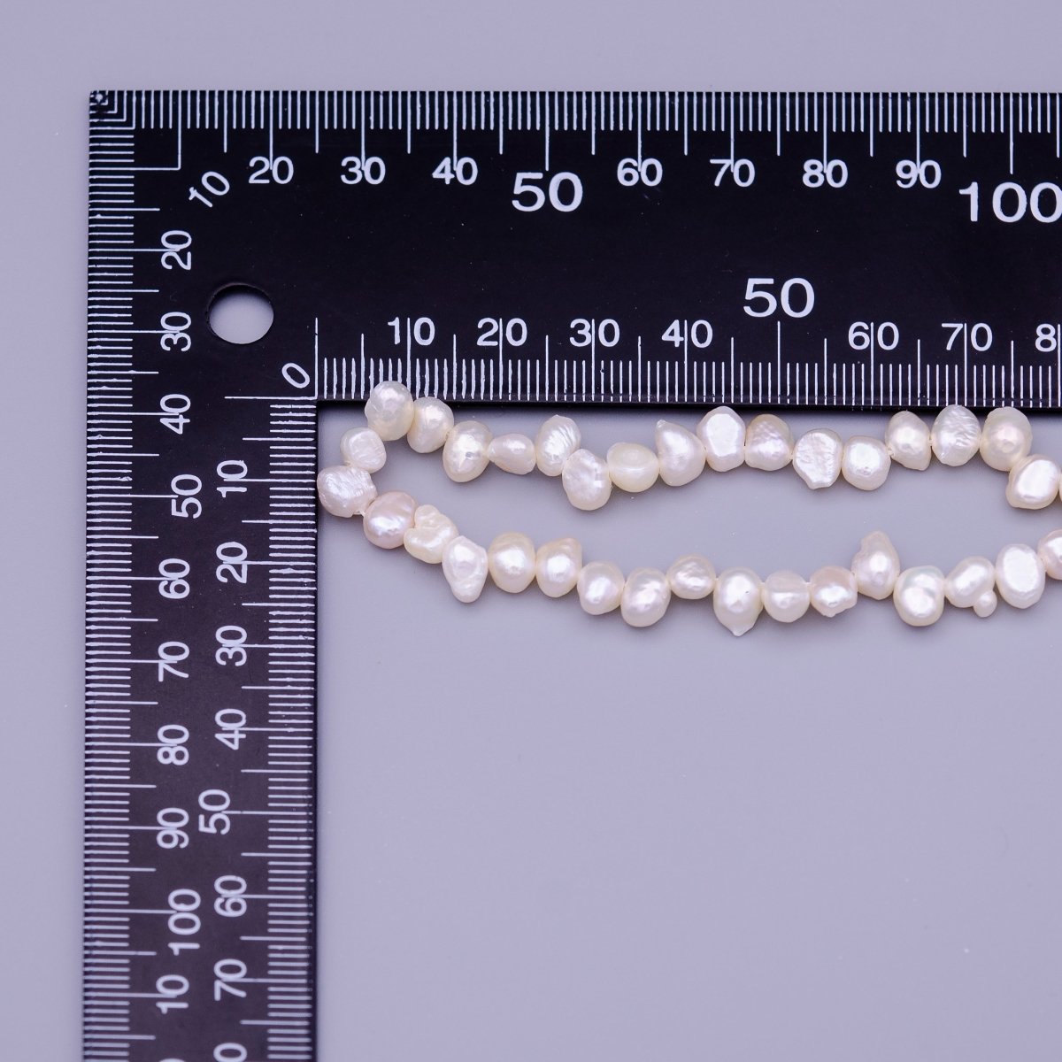 6.7mm - 7.6mm Nugget Seed White Natural Freshwater Pearl 71pcs Full Strand | WA-1317 Clearance Pricing