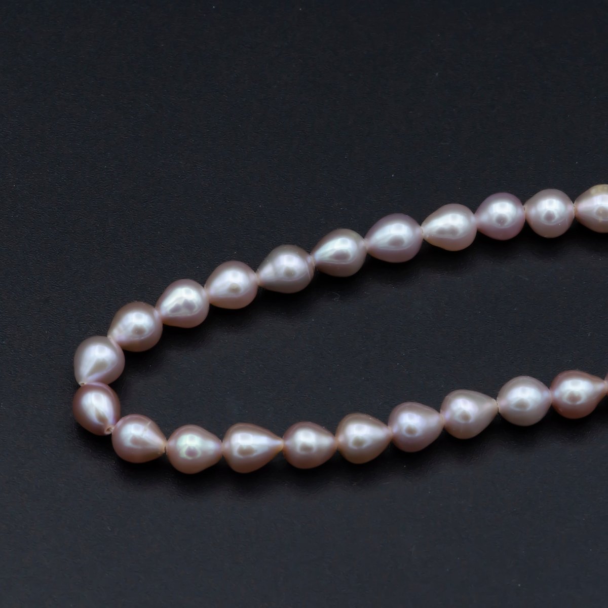 AAA 5.5mm Pink Champagne rice freshwater pearl teardrop pearl per Strand Wholesale Bulk | WA-564 Clearance Pricing