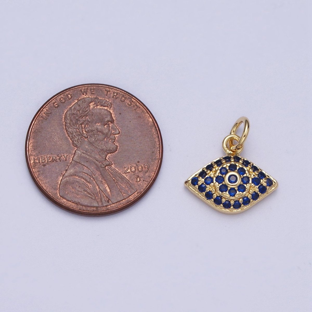 Dainty Blue Micro Paved CZ Gold Evil Eye Charm | N-380