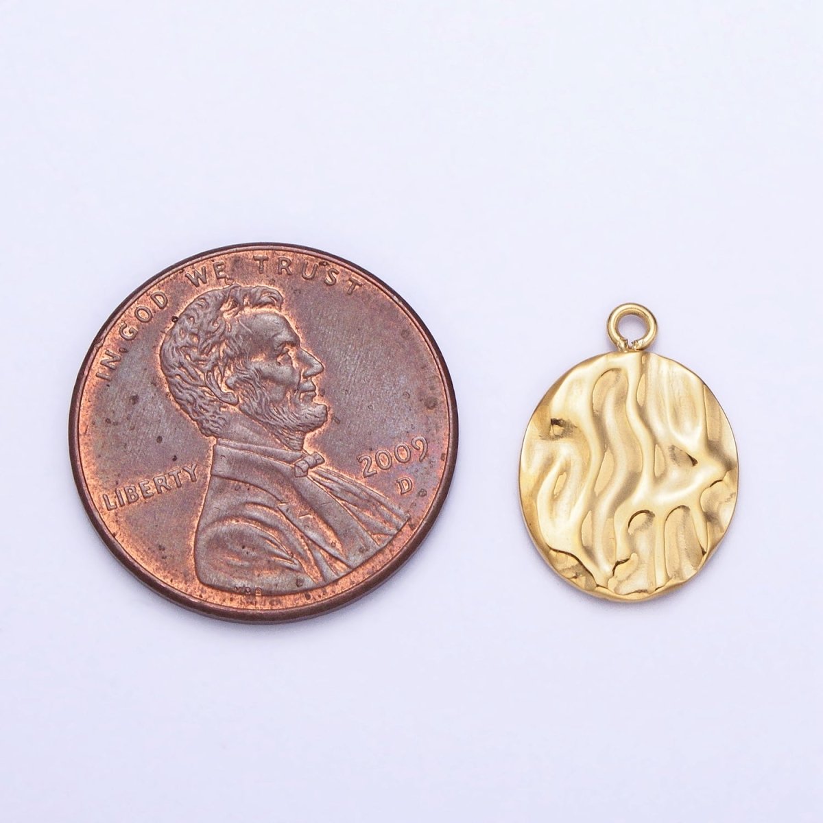 Gold, Silver Double Sided Oval Hammered Charm in Gold & Silver | P-890