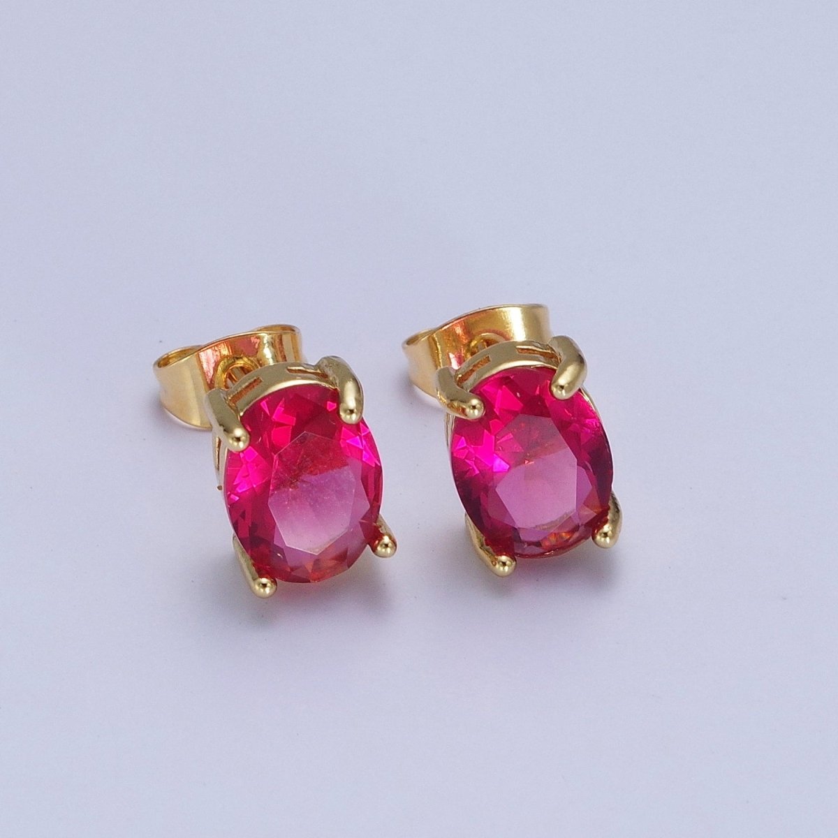 Minimalist Fuchsia Oval Cubic Zirconia Gold Stud Earrings | AD-579