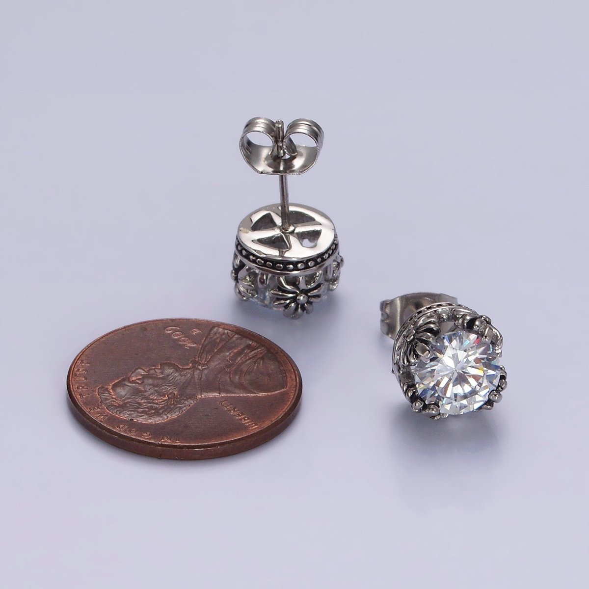 Stainless Steel 8.5mm Clear Round CZ Flower Lined Stud Earrings | AE756