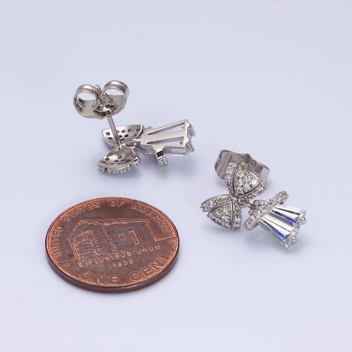 White Gold Filled Micro Paved CZ Ribbon Clear Baguette Bell Stud Earrings | AD1454